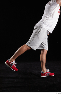 Louis  2 dressed flexing grey shorts leg red sneakers…